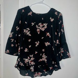 Black blouse with floral design Size S flutter bottom